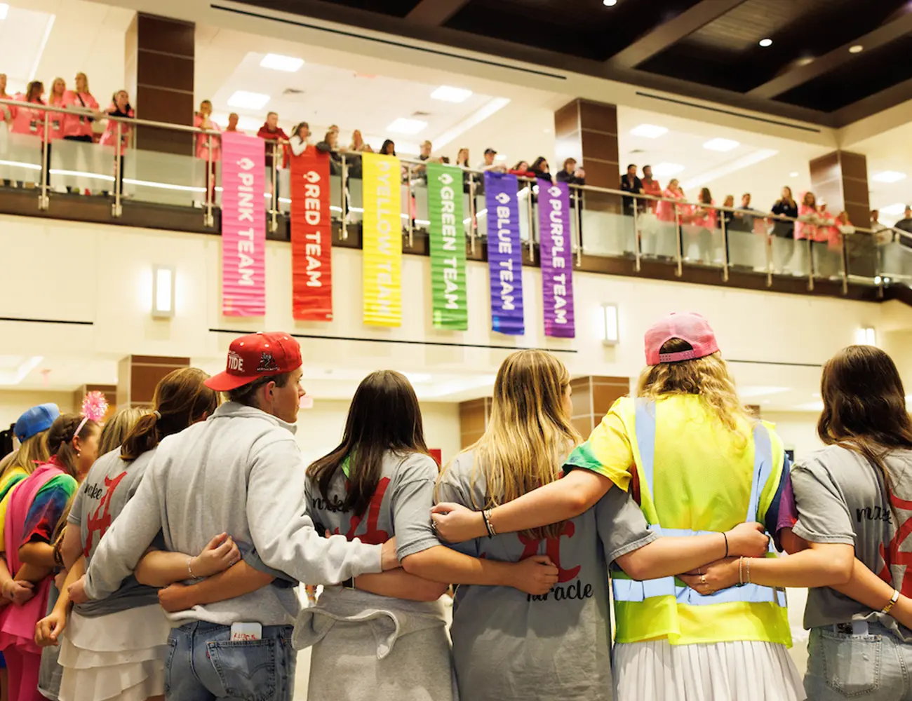 Dance Marathon under team color banners