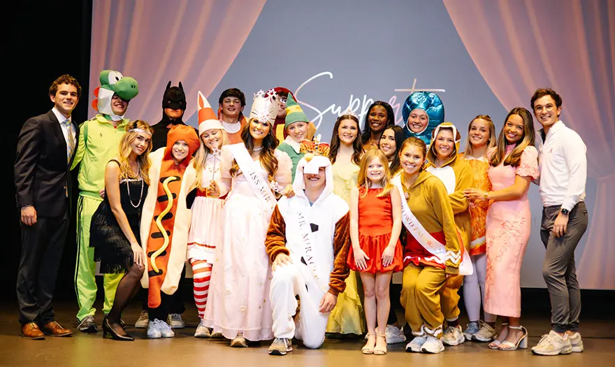 Mr. and. Miss Miracle with others in costumes